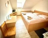 Dvoulůžkové pokoje v patře s možností přistýlky.webp